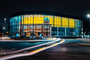 Photograph of Danum frontage within glass casing lit up at night