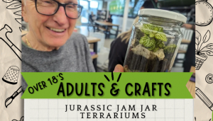 Image of man and hand made jam jar terrarium.